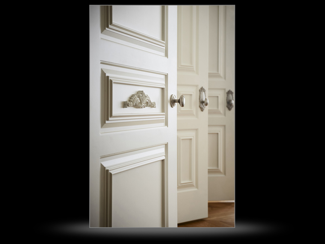 Architectural detail of three open doors